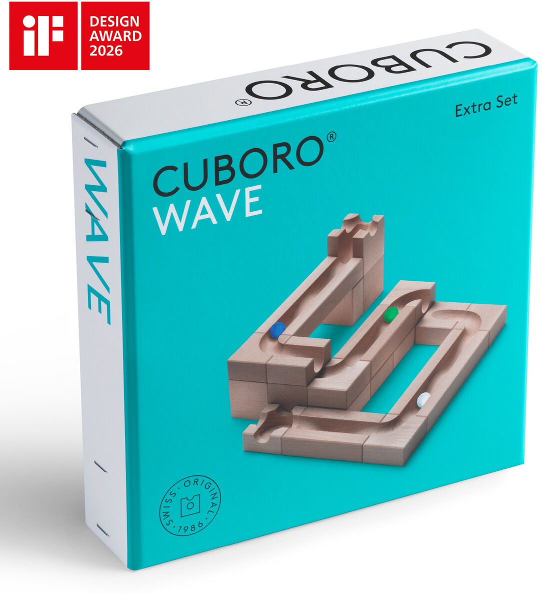 Die Verpackung des CUBORO Kugelbahn Sets »WAVE« zeigt einen türkisfarbenen Karton mit silberner und schwarzer Aufschrift. Abgebildet sind die charakteristischen Holzbausteine mit Wellenrinnen und farbigen Kugeln. Links oben ist das iF Design Award 2026-Logo sichtbar.