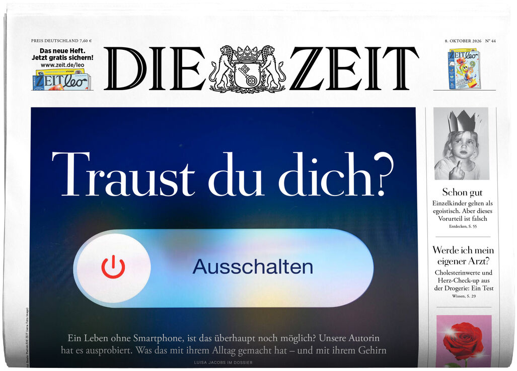 Vorderseite der Wochenzeitung DIE ZEIT Ausgabe 44/2026 mit großem blauen Bereich und Text 'Traust du dich?' über einem digitalen Ausschalten-Button. Oben der Zeitungsname, rechts kleine Artikelvorschauen und ein rotes Rosenfoto. Modernes, seriöses Layout.