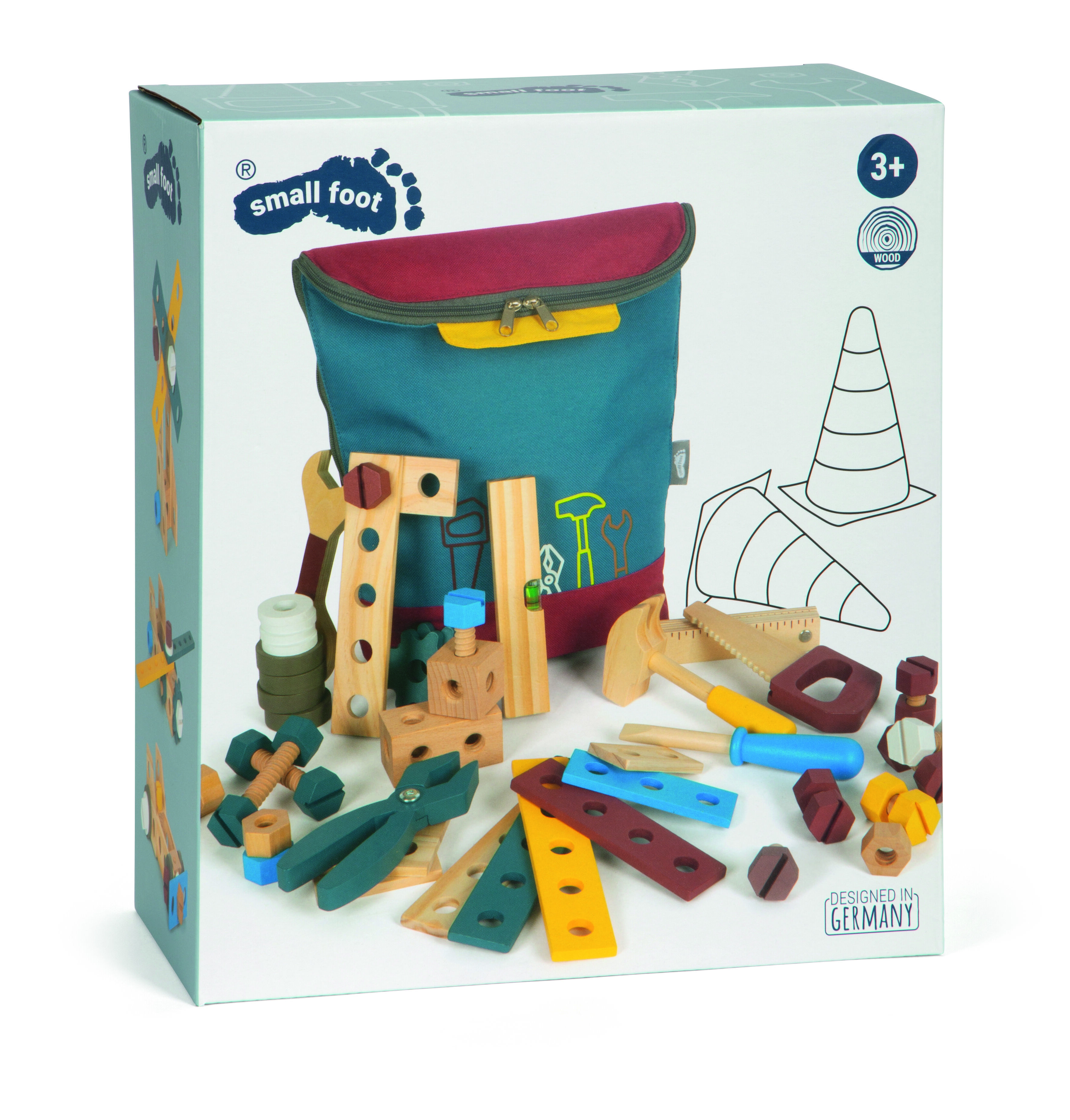 Abgebildet ist eine Produktverpackung eines Werkzeugrucksacks für Kinder namens 'Workshop' von small foot. Die Verpackung zeigt einen grünen Rucksack mit gelbem Reißverschluss und verschiedenfarbige Holzspielzeuge wie Werkzeuge, Schrauben, Muttern und Lochleisten, geeignet für Kinder ab 3 Jahren. Im Hintergrund ist eine Zeichnung eines Verkehrshütchens abgebildet.