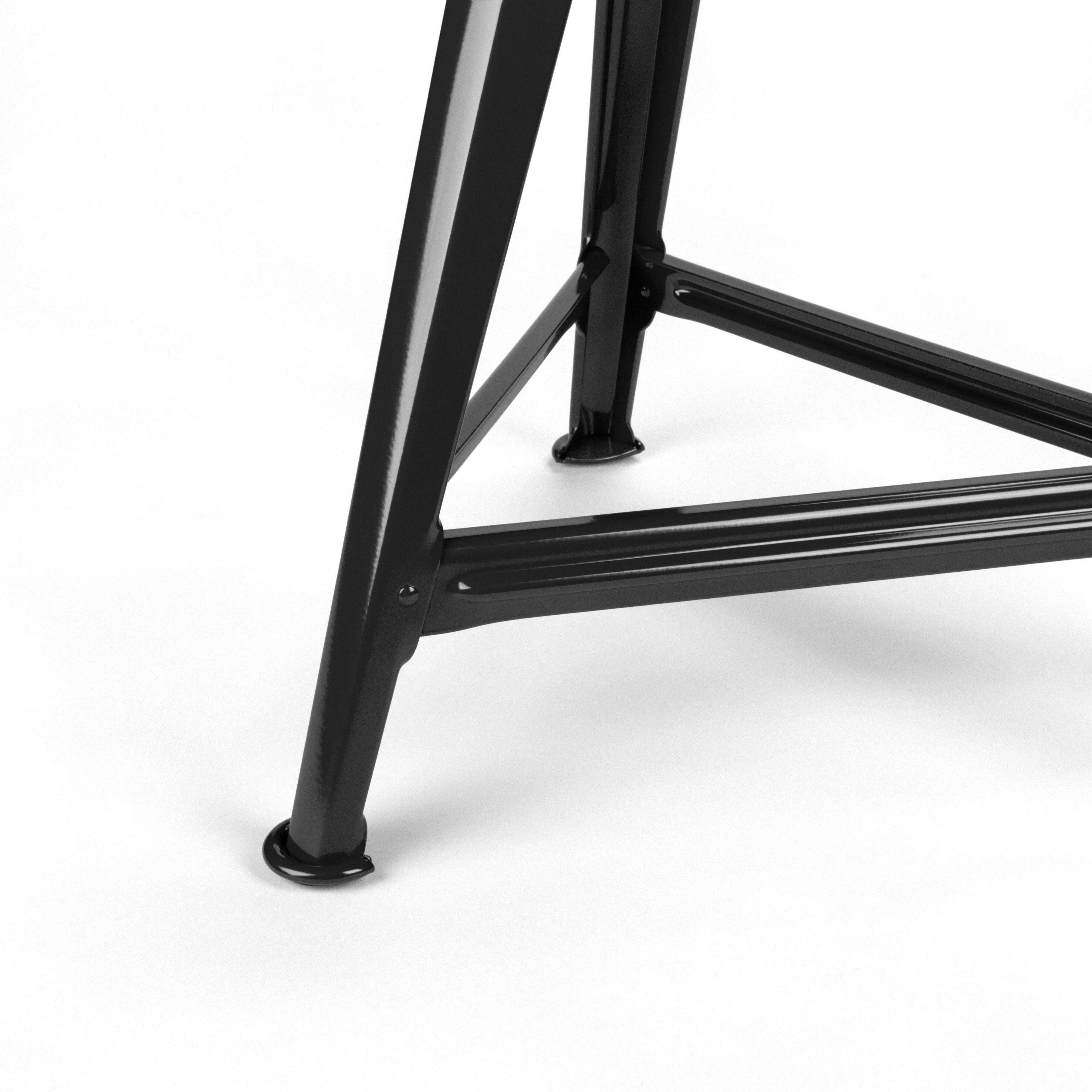 Detailaufnahme eines schwarzen Metallhockers der Marke Rowac-Schemel, Modell Just Steel, mit klaren Linien und industriellem Design. Der Hocker steht auf einem weißen Hintergrund und zeigt eine stabile Stahlkonstruktion mit verschweißten Elementen.