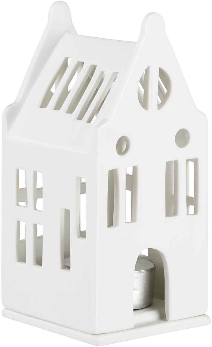 Ein weißes Keramik-Lichthaus in Form eines Herrenhauses mit Details wie Fenstern und einem kleinen Eingang, das als Teelichthalter dient.