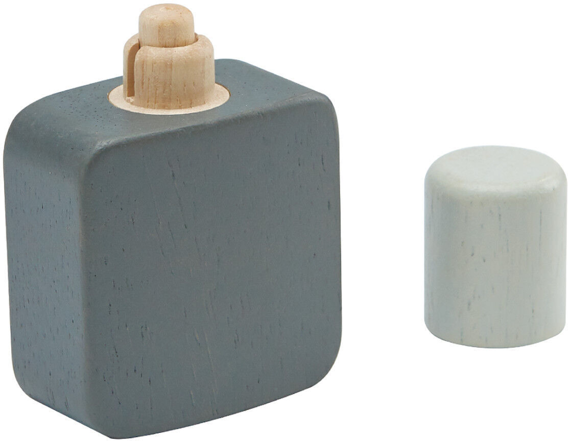 Rasier-Set für Kinder aus Holz, bestehend aus einem grauen, quadratischen Behälter mit einem herausnehmbaren Deckel.