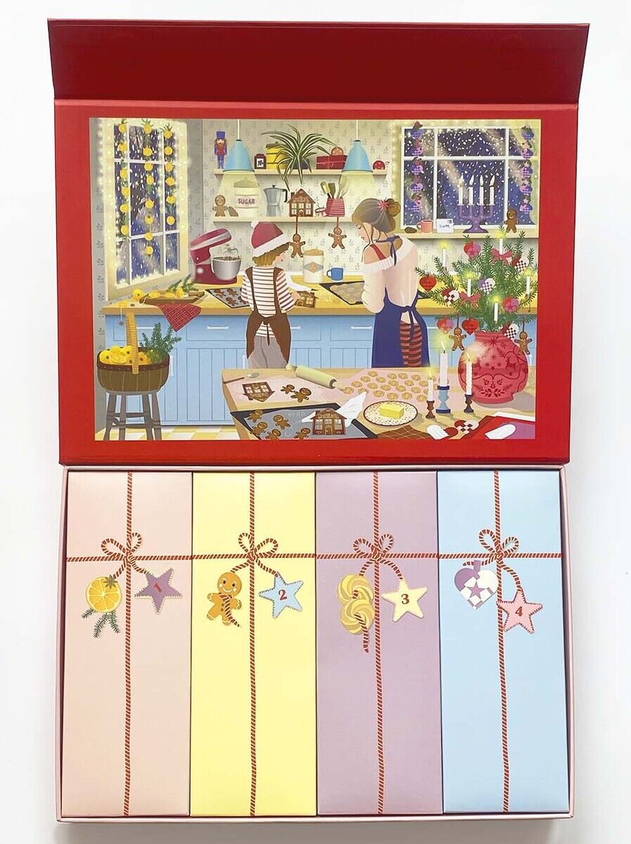 Der offene Puzzle-Adventskalender »Sweet Christmas« von VISSEVASSE zeigt ein farbenfrohes, detailliertes Küchenmotiv mit zwei backenden Personen in weihnachtlicher Stimmung. Unten sind nummerierte Adventsfächer in Pastelltönen mit kleinen Weihnachtssymbolen zu sehen.