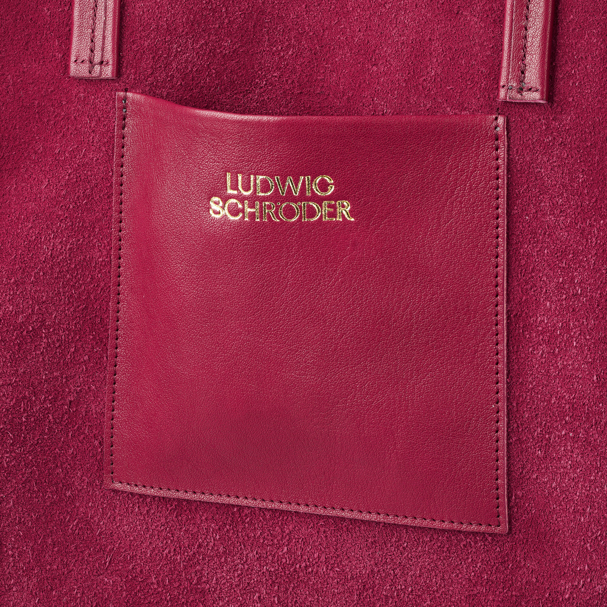 Ledershopper »Marie« in Rot mit goldenen Akzenten, hergestellt von Ludwig Schröder. Elegante und praktische Damenhandtasche.