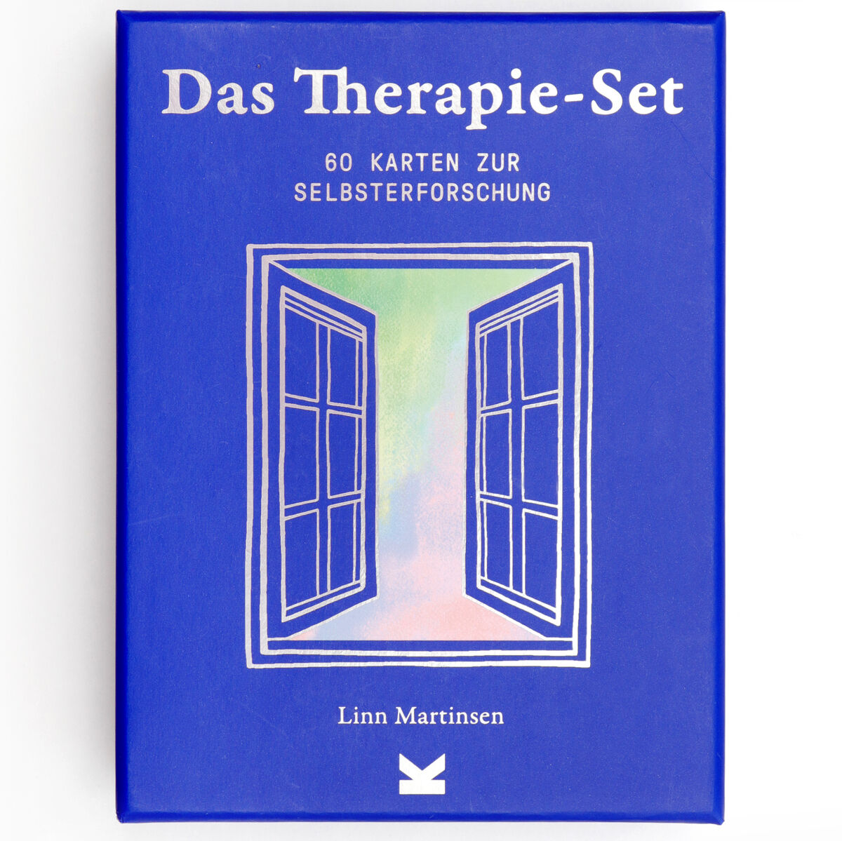 Das Therapie-Set mit 60 Karten zur Selbsterforschung, geschrieben von Linn Martinsen. Die Verpackung ist blau mit einem stilisierten Bild von geöffneten Fenstern und weißen Texten.