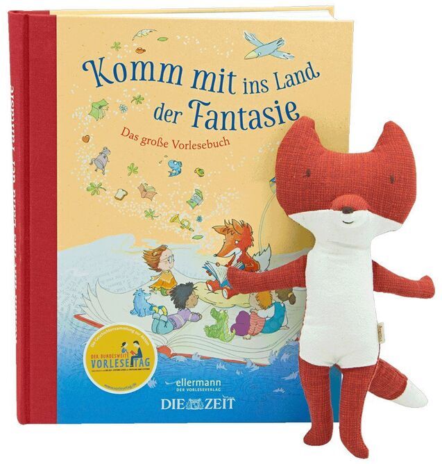 Geschenkset mit einem großen Vorlesebuch 'Komm mit ins Land der Fantasie' und einem kleinen, kuscheligen Fuchs-Plüschtier. Das Buch hat einen roten Rücken und ein gelbes Cover mit Illustrationen von Tieren in einem Boot.