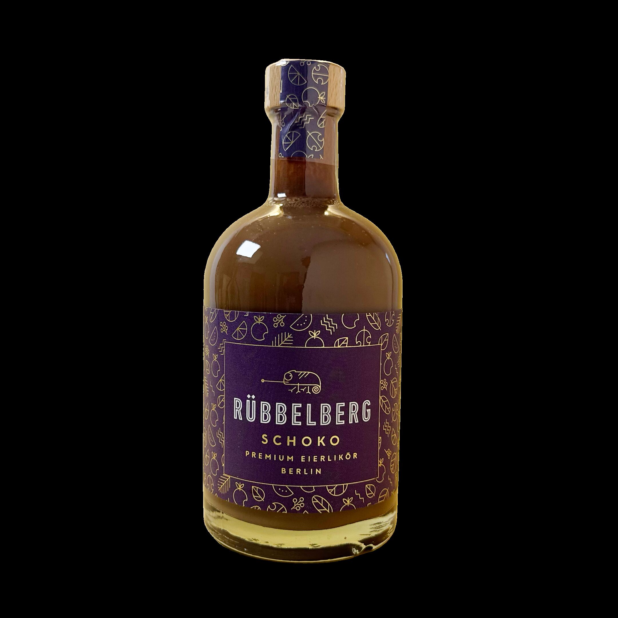 Eine Flasche Rübbelberg Premium Eierlikör Schoko mit 500ml Inhalt. Die Flasche hat ein lila Etikett mit goldenen grafischen Elementen und befindet sich auf weißem Hintergrund.