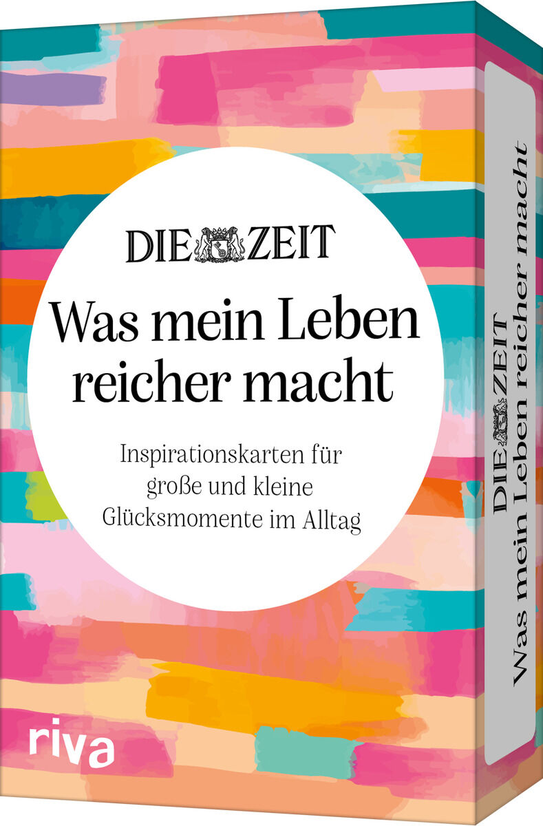 Abgebildet ist eine rechteckige Schachtel mit dem Titel des Kartenspiels „Was mein Leben reicher macht“ von DIE ZEIT, gestaltet mit bunten horizontalen Pinselstrichen in Pink, Türkis, Gelb und Orange. In der Mitte befindet sich ein weißer Kreis mit schwarzer Schrift. Die Verpackung wirkt fröhlich und einladend.
