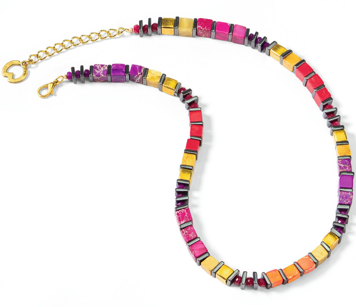 Eine farbenfrohe Halskette von Petra Waszak namens 'Cambria' mit bunten Perlen in Lila, Pink, Rot, Orange und Gold sowie schwarzen Zwischenteilen. Ideal als modisches Accessoire oder Geschenk.