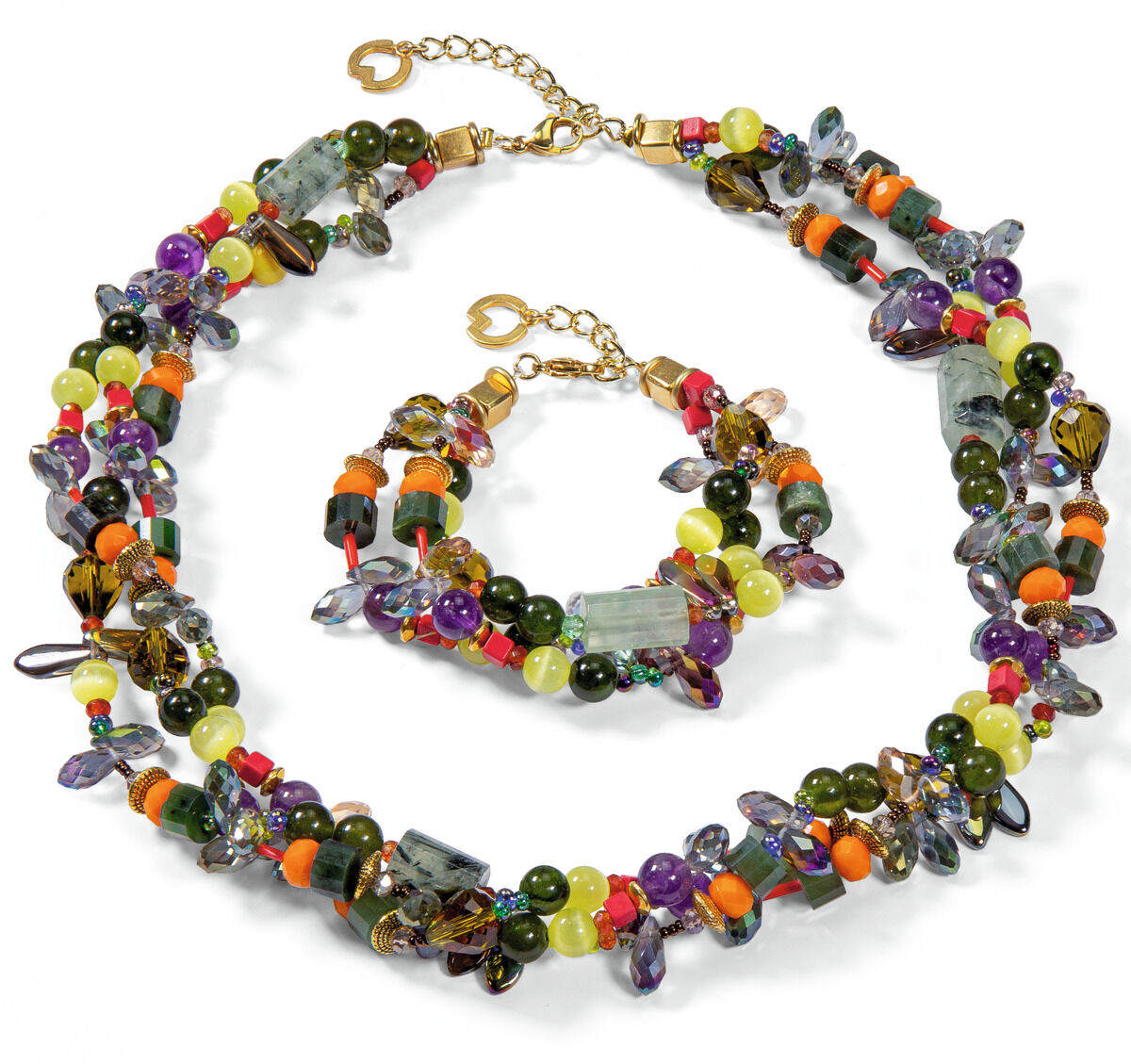 Farbintensives Schmuckset von Petra Waszak namens 'Schmuckset Fanny', bestehend aus einer Halskette und einem Armband, beide mit bunten Glasperlen in Grün, Lila, Orange, Schwarz und goldenen Akzenten.