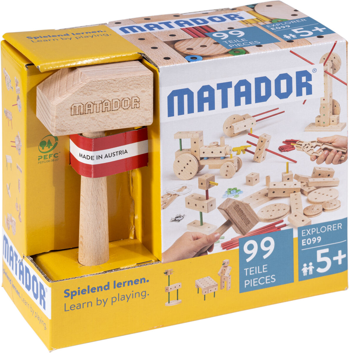 Holzkonstruktionsbaukasten »Explorer E099«, 99-teilig von Matador, mit Holzbauteilen und Werkzeug. Verpackung in Gelb und Blau mit Produktabbildung und kleinen Bauprojekten. Geeignet für Kinder ab 5 Jahren.