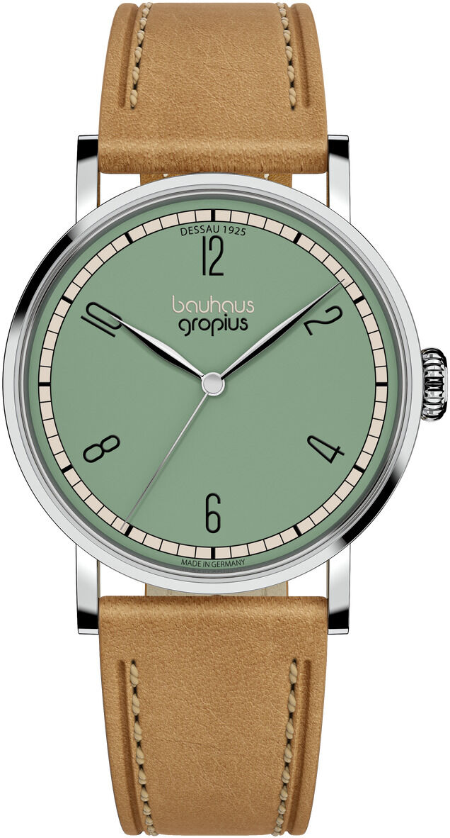 Die ZEIT-Sonderedition Uhr »Frauen am Bauhaus« Mint zeigt ein mintgrünes Zifferblatt mit schlichtem Bauhaus-Design, schwarzen Indizes und Zeigern. Das Gehäuse besteht aus poliertem Edelstahl, das Armband ist hellbraun und aus Leder. Limitierte Auflage, eleganter Stil.