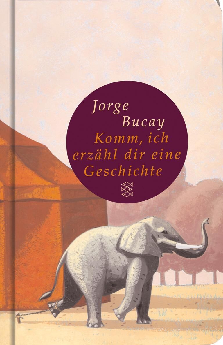 Ein Buchcover von 'Komm, ich erzähl dir eine Geschichte' von Jorge Bucay. Das Cover zeigt einen Elefanten, der vor einem rot-orangefarbenen Zelt oder Gebäude steht, mit Bäumen im Hintergrund. Der Titel ist in einem dunklen Kreis in der Mitte des Buches platziert.