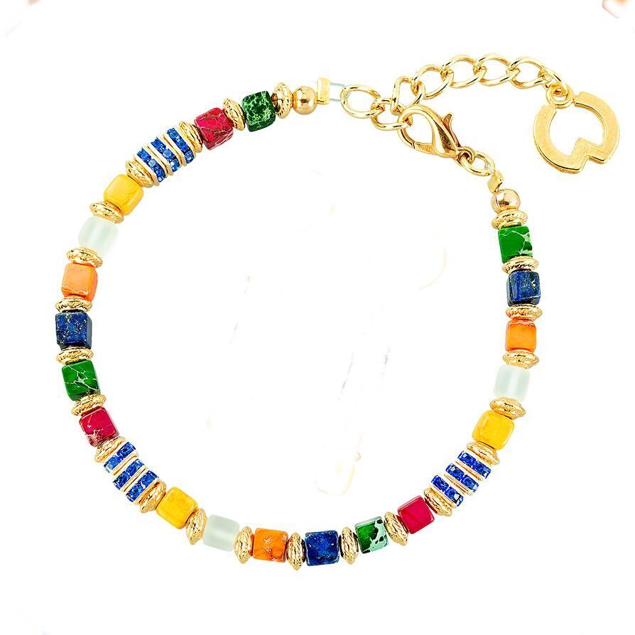 Farbenfrohes Schmuckset »Kolibri« – inspiriert von Franz Marc. Gold- und bunte Perlen, kunstvoll arrangiert als Armband.