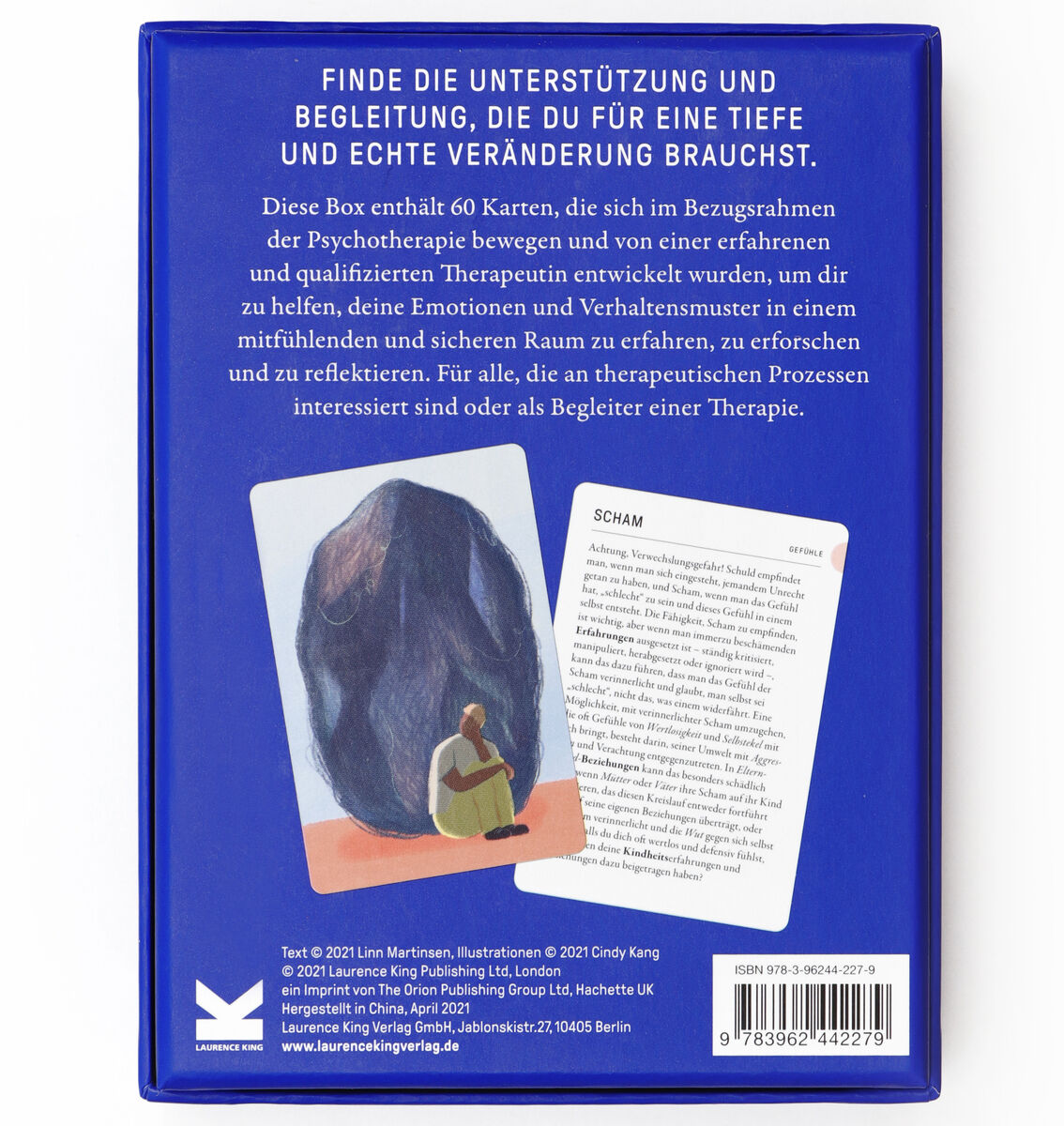 Das Bild zeigt die Rückseite eines blauen Therapie-Sets. Oben steht ein Text, der Unterstützung und therapeutische Begleitung für tiefgehende und echte Veränderungen verspricht. In der Mitte und unten sind Kartenausschnitte und eine Erklärung der Nutzung des Sets. Das Produkt ist für Therapeuten, Psychologen und zur Selbsthilfe geeignet.