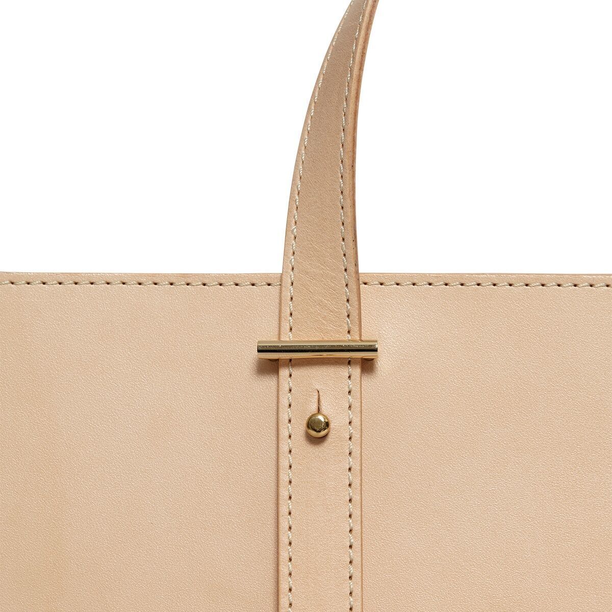 ZEIT-Sonderedition Tragetasche »DIE ZEIT 1« aus hochwertigem beigem Leder mit minimalistischer goldener Hardware.