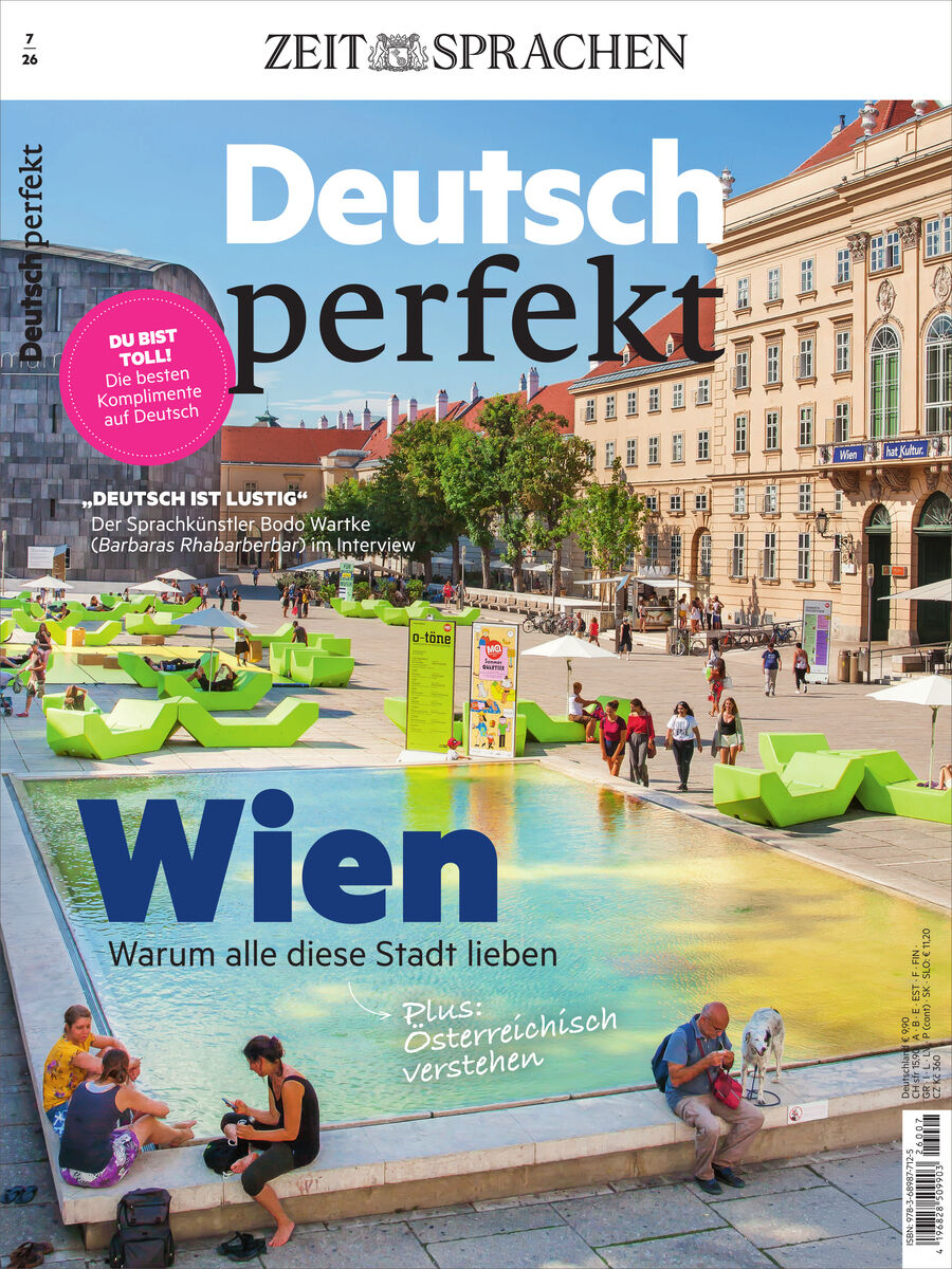 Cover des Magazins „Deutsch perfekt“ von Spotlight Verlag, Ausgabe 7/2026, mit Titelthema Wien. Das Bild zeigt einen sonnigen Stadtplatz mit Wasserbecken, modernen grünen Sitzmöbeln, Menschen und historischen Gebäuden. Titel und weitere Themenschwerpunkte sind sichtbar.