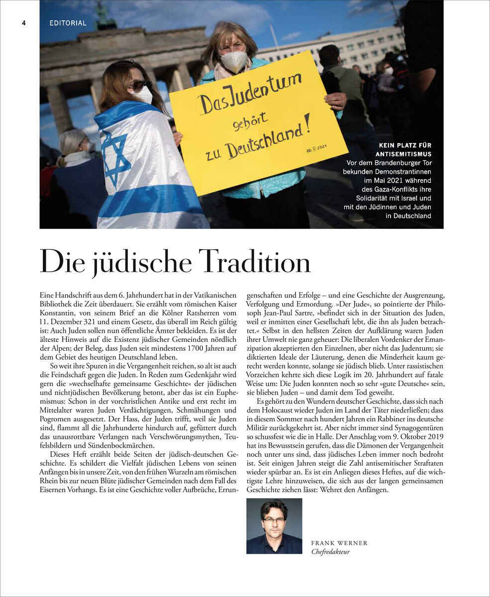 Eine Seite aus der Zeitschrift 'Zeit Geschichte 6/21 Jüdisches Leben in Deutschland' zeigt einen Protestschild mit der Aufschrift 'Das Judentum gehört zu Deutschland' und darunter einen redaktionellen Text über die jüdische Tradition und Geschichte in Deutschland.