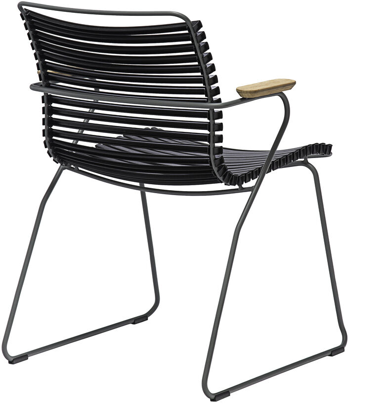 Der »CLICK Dining Chair« mit Armlehne ist ein moderner Stuhl mit schwarzem Stahlrahmen und Holzdetails. Ideal für Esszimmer und Wohnzimmer sowie Terrassen und Außenbereiche.