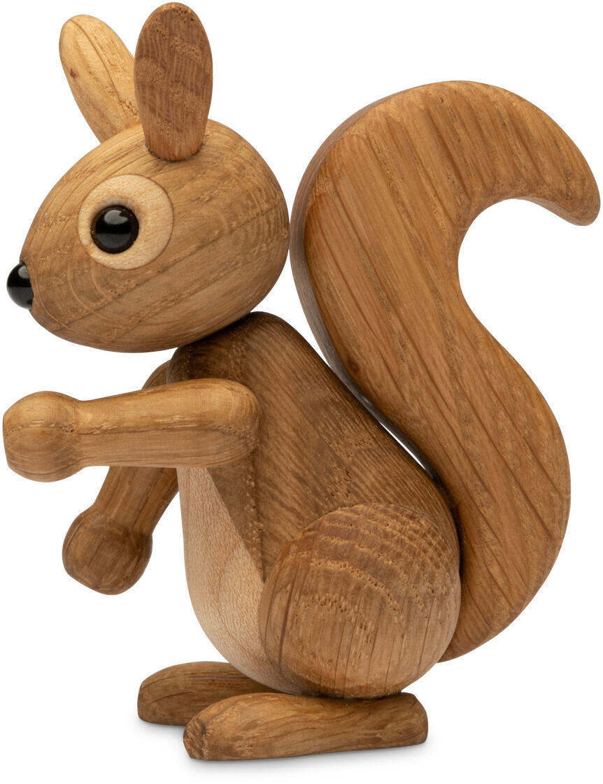 Auf dem Bild ist eine detailreiche Eichhörnchenfigur aus Naturholz zu sehen. Die Holzfigur mit großen Ohren, buschigem Schwanz und schwarzen Knopfaugen steht aufrecht und strahlt durch die feine Verarbeitung eine natürliche und freundliche Ausstrahlung aus. Geeignet als dekoratives Wohnaccessoire oder Geschenk, besonders für Naturfreunde und Kinder.