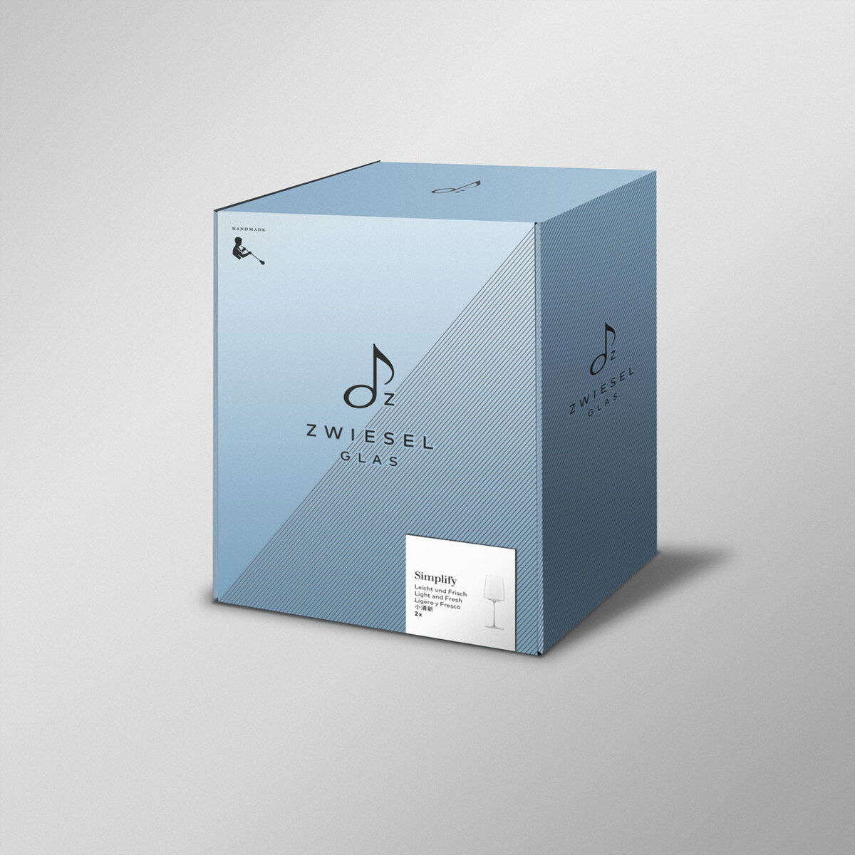 Ein blau-weißes Verpackungskarton-Set mit der Aufschrift 'Zwiesel Glas' und einer Etikette 'Simplify' für zwei stilvolle Sektgläser.