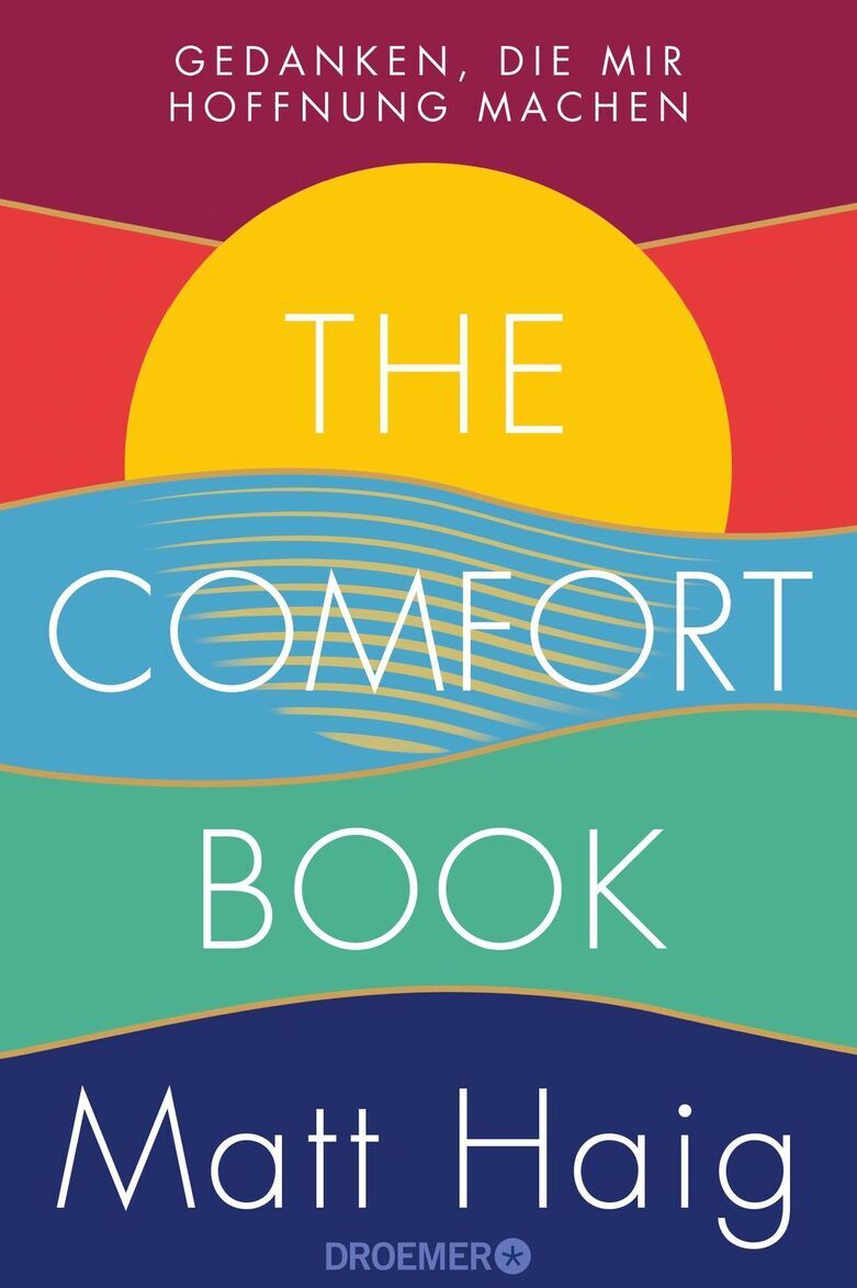 Das Bild zeigt das Buchcover von 'The Comfort Book' von Matt Haig. Im oberen Teil des Covers steht der Text 'Gedanken, die mir Hoffnung machen'. Das Cover ist in kräftigen Farben gestaltet: Gelb, Rot, Blau und Grün, und zeigt ein stilisiertes Bild eines Sonnenaufgangs über ruhigen Wellen. Der Name des Autors, Matt Haig, ist am unteren Rand des Covers in weiß geschrieben.