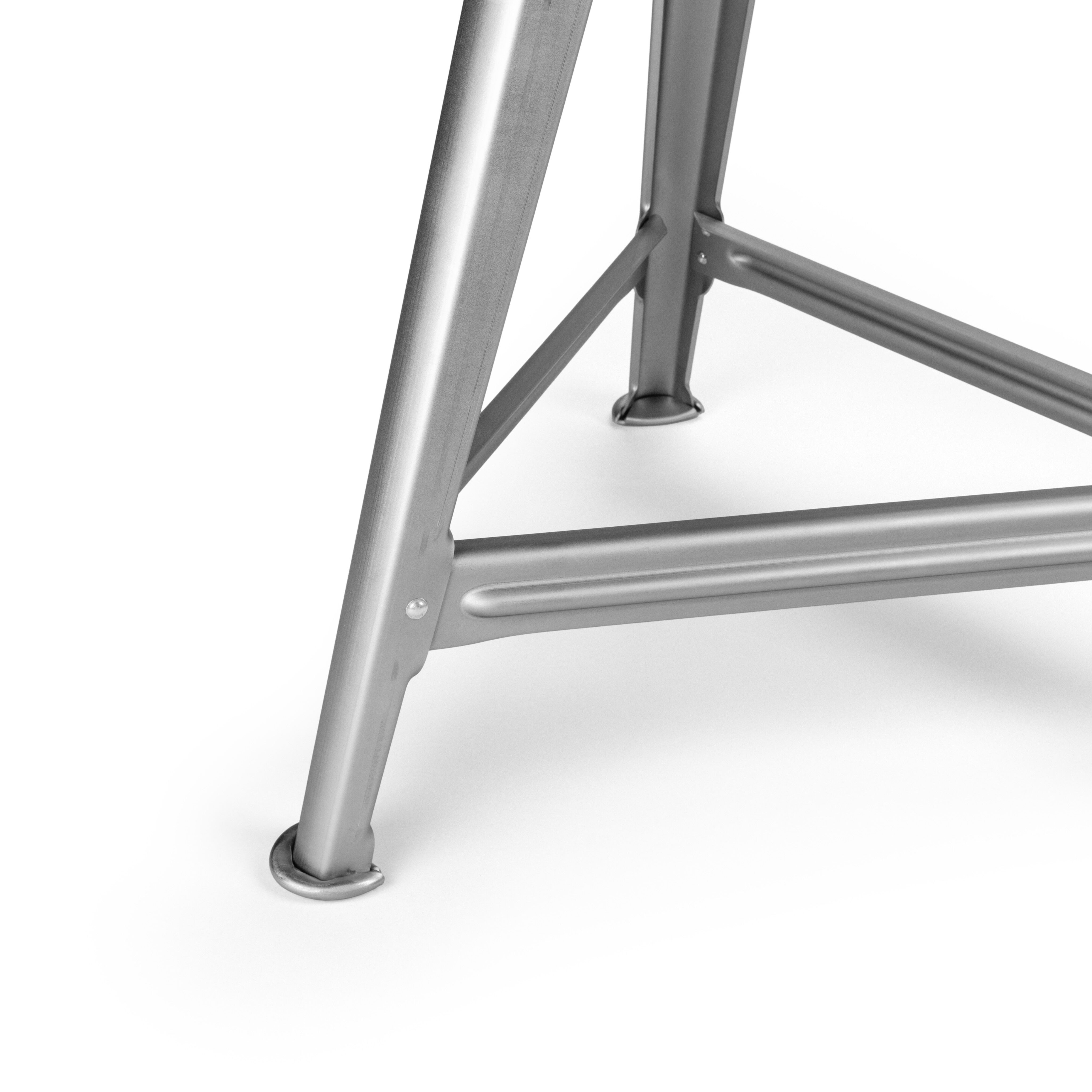 Metallhocker der ZEIT-Sonderedition Rowac-Schemel 'Naked Steel' mit sichtbarer Stahlstruktur und klarem Industriedesign, abgebildet auf weißem Hintergrund.