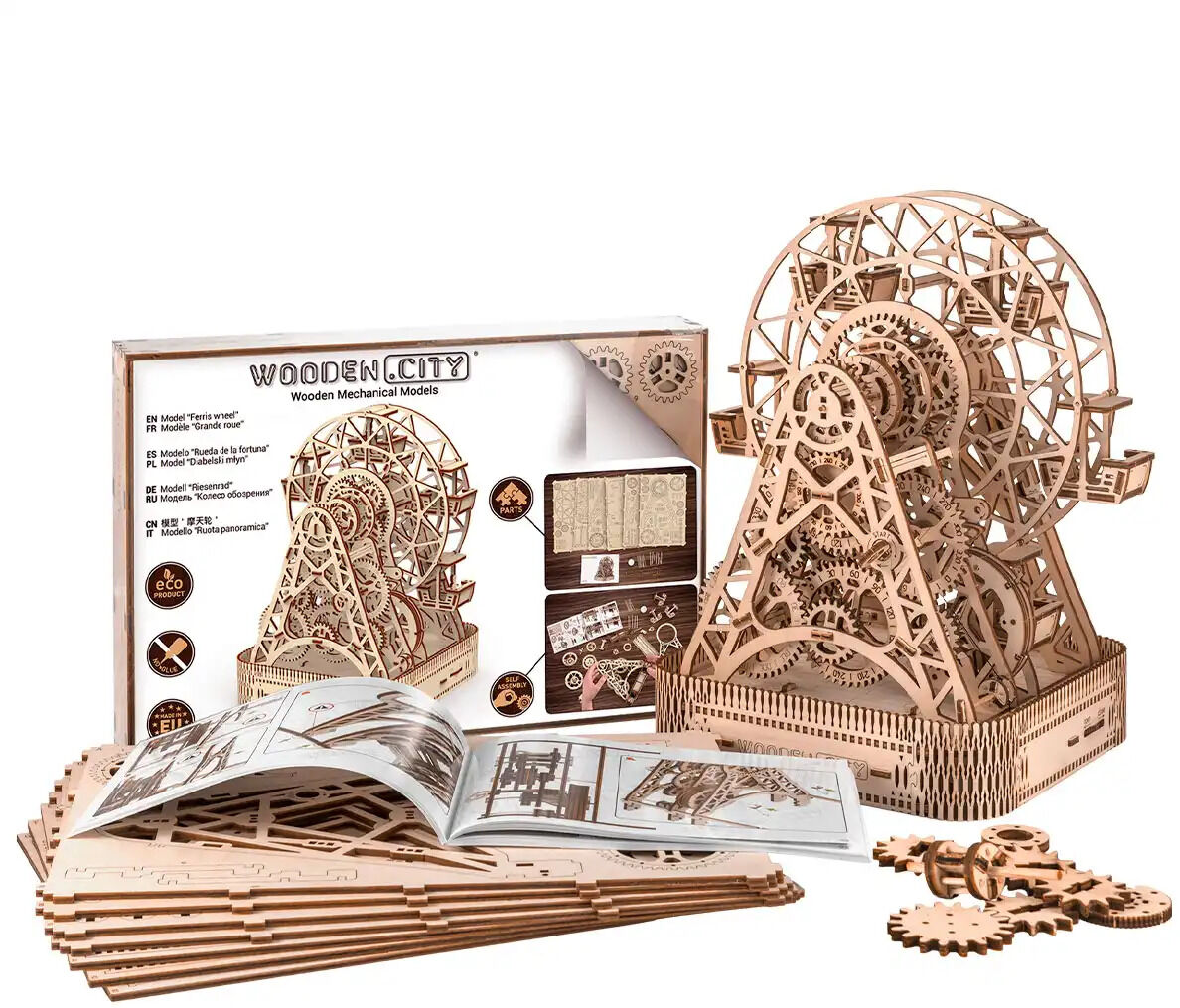 Zentral im Bild ein detailliertes, fertig aufgebautes 3D-Holzmodell eines Riesenrads von Invento, daneben die Verpackung, Anleitung, Holzbögen mit lasergeschnittenen Einzelteilen sowie einige Zahnräder. Die Szenerie vermittelt hochwertige Handwerkskunst und Bastelspaß.