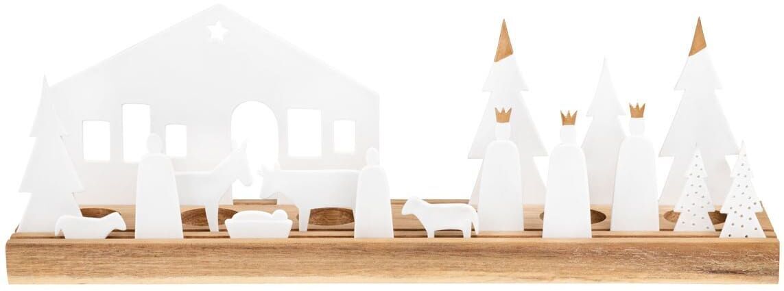 Eine minimalistische Krippe auf einem hölzernen Untergrund. Enthält weiße Figuren von Josef, Maria, dem Jesuskind, sowie mehreren Heiligen und Tieren. Drei Tannenbäume sind ebenfalls Teil der Szene.