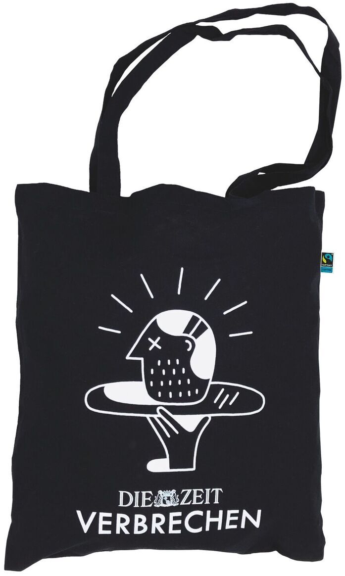 Schwarze Stofftasche mit weißem Aufdruck. Der Aufdruck zeigt einen abstrakten Kopf mit einer Sonnenstrahlen-Krone darüber und darunter den Schriftzug 'DIE ZEIT VERBRECHEN'. Die Tasche hat lange Henkel.