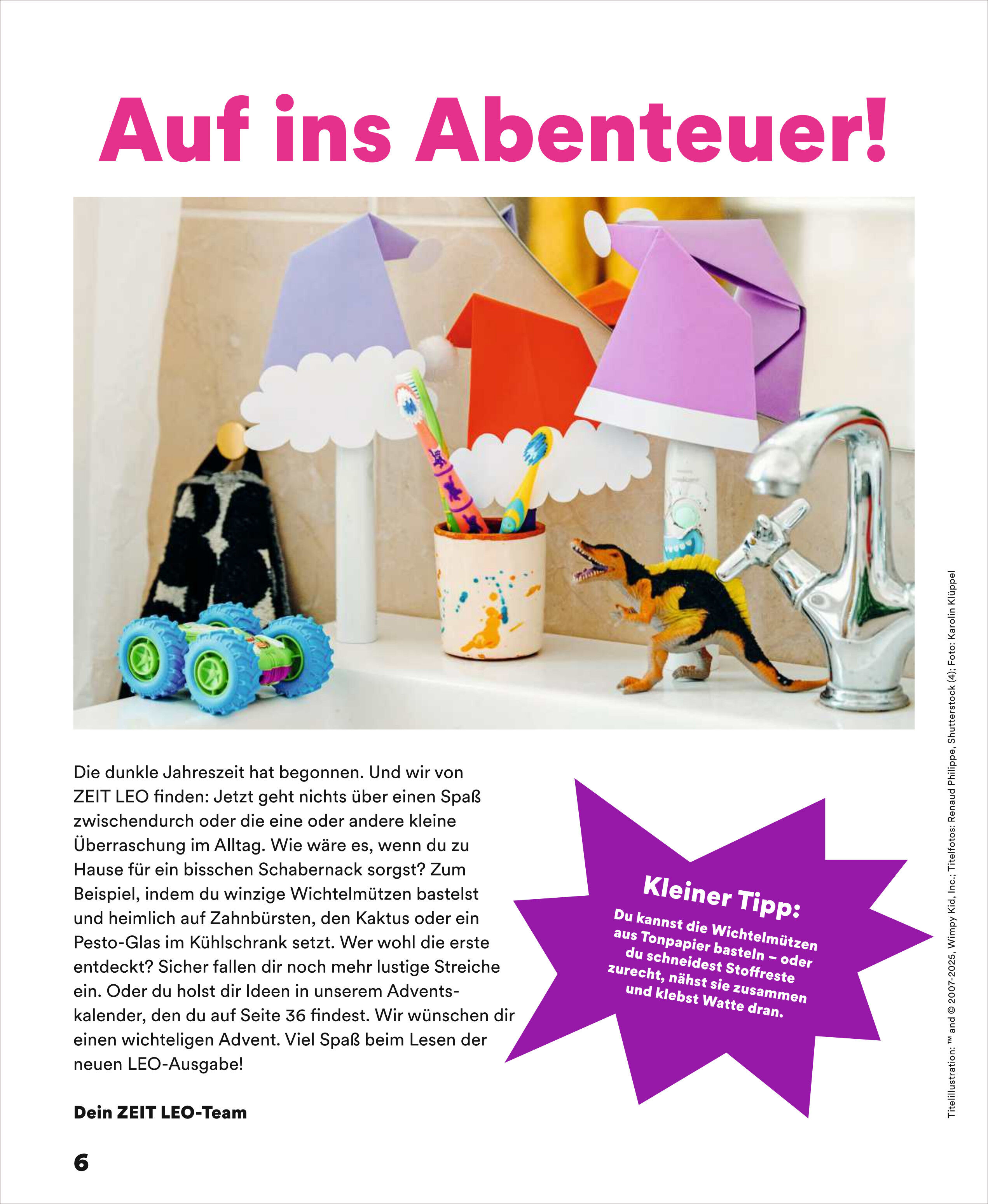 Ausschnitt aus einer Kinderzeitschrift mit bunten Origami-Häusern, einem Dinosaurier-Spielzeug und Zahnbürsten in einem Becher vor einem Wasserhahn. Text zu Bastelideen und ein Tippkästchen sind abgebildet.