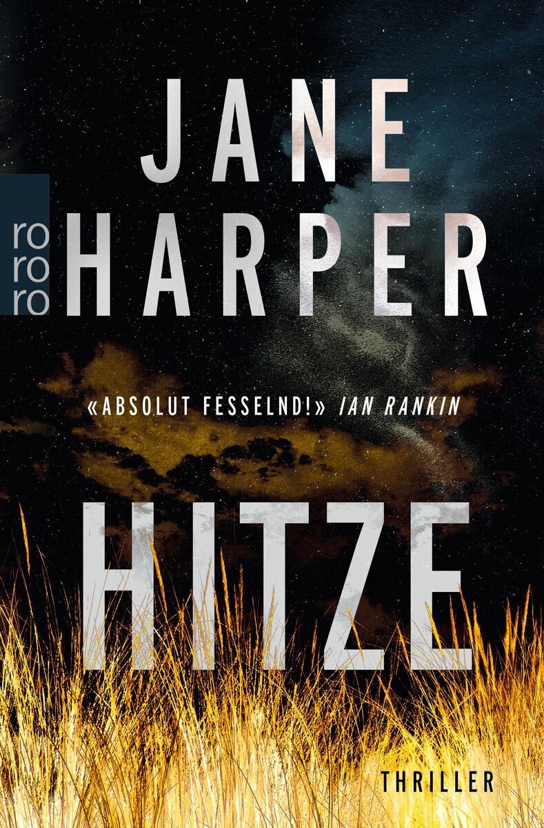 Buchcover von 'Hitze' von Jane Harper, zeigt ein brennendes Feld unter einem düsteren Himmel und enthält den Schriftzug 'Absolut fesselnd! - Ian Rankin'.