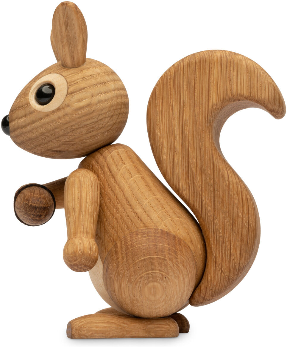 Seitliche Ansicht einer detailreich gearbeiteten Eichhörnchenfigur aus naturfarbenem Holz mit großem buschigen Schwanz, runden schwarzen Augen und dezenter Maserung – ideal als Dekoration oder Geschenk.