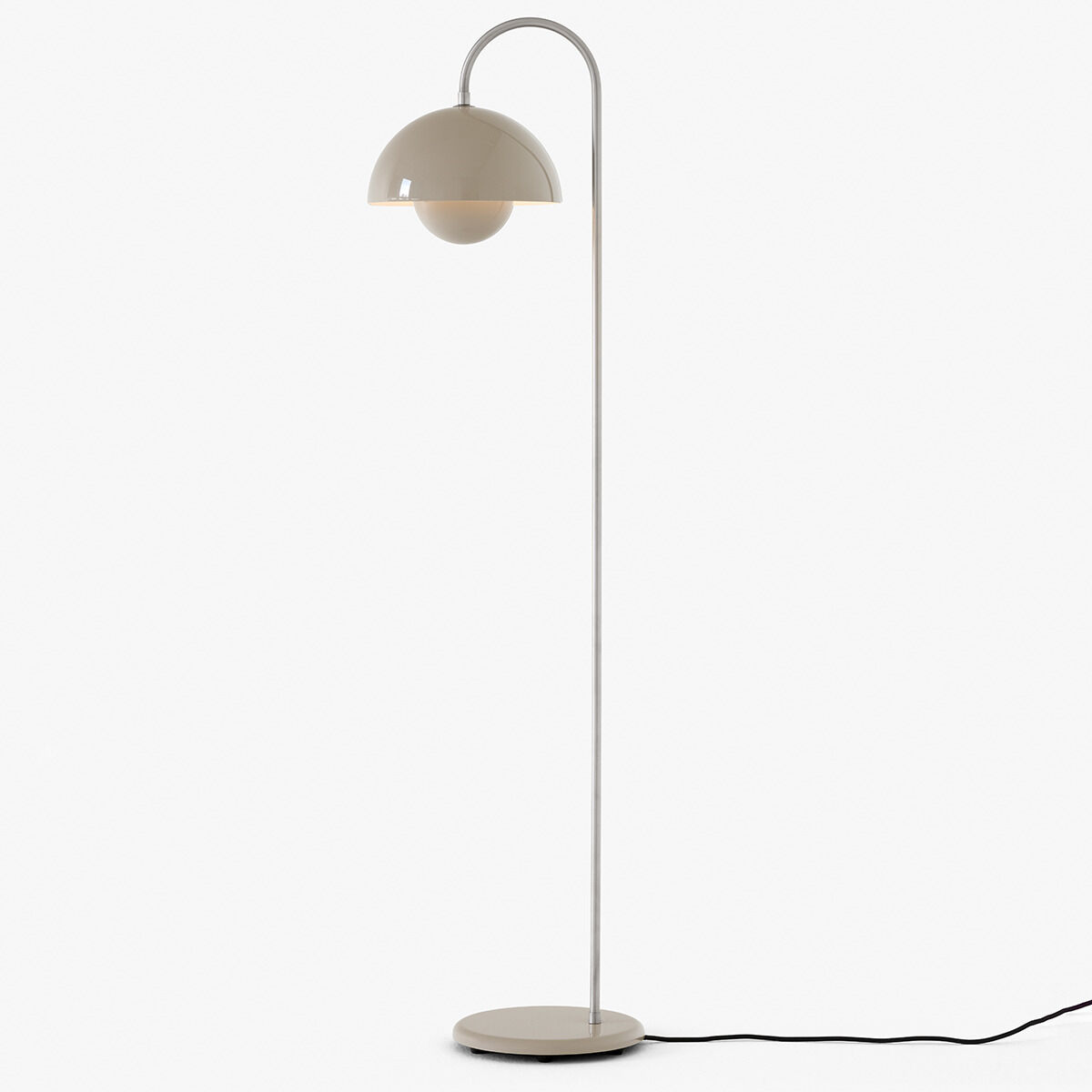 Ein moderner Blumentopf in einem minimalistischen Design. Der VP12 Blumentopf hat eine beige Oberfläche und steht auf einem weiß-grauen Ständer.