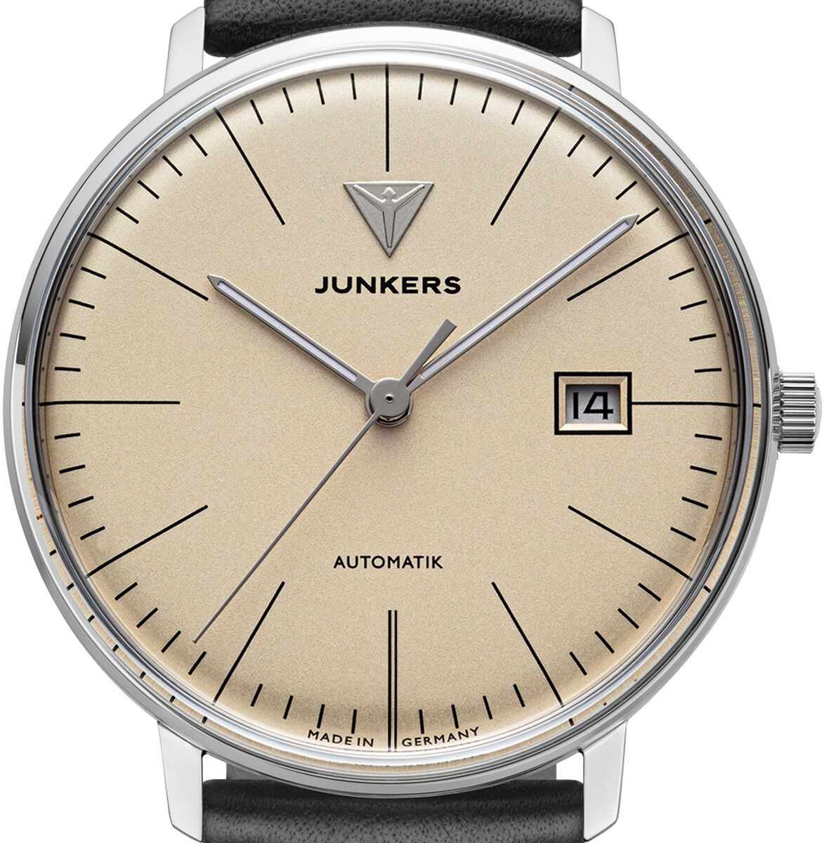 Abgebildet ist die ZEIT-Sonderedition Uhr "Bauhaus Automatik" der Marke Junkers Uhren. Die Armbanduhr besitzt ein beiges Zifferblatt mit feinen schwarzen Indizes, ein Datumfenster, silbernes Edelstahlgehäuse und ein schwarzes Lederarmband. Schlichtes, elegantes Design.