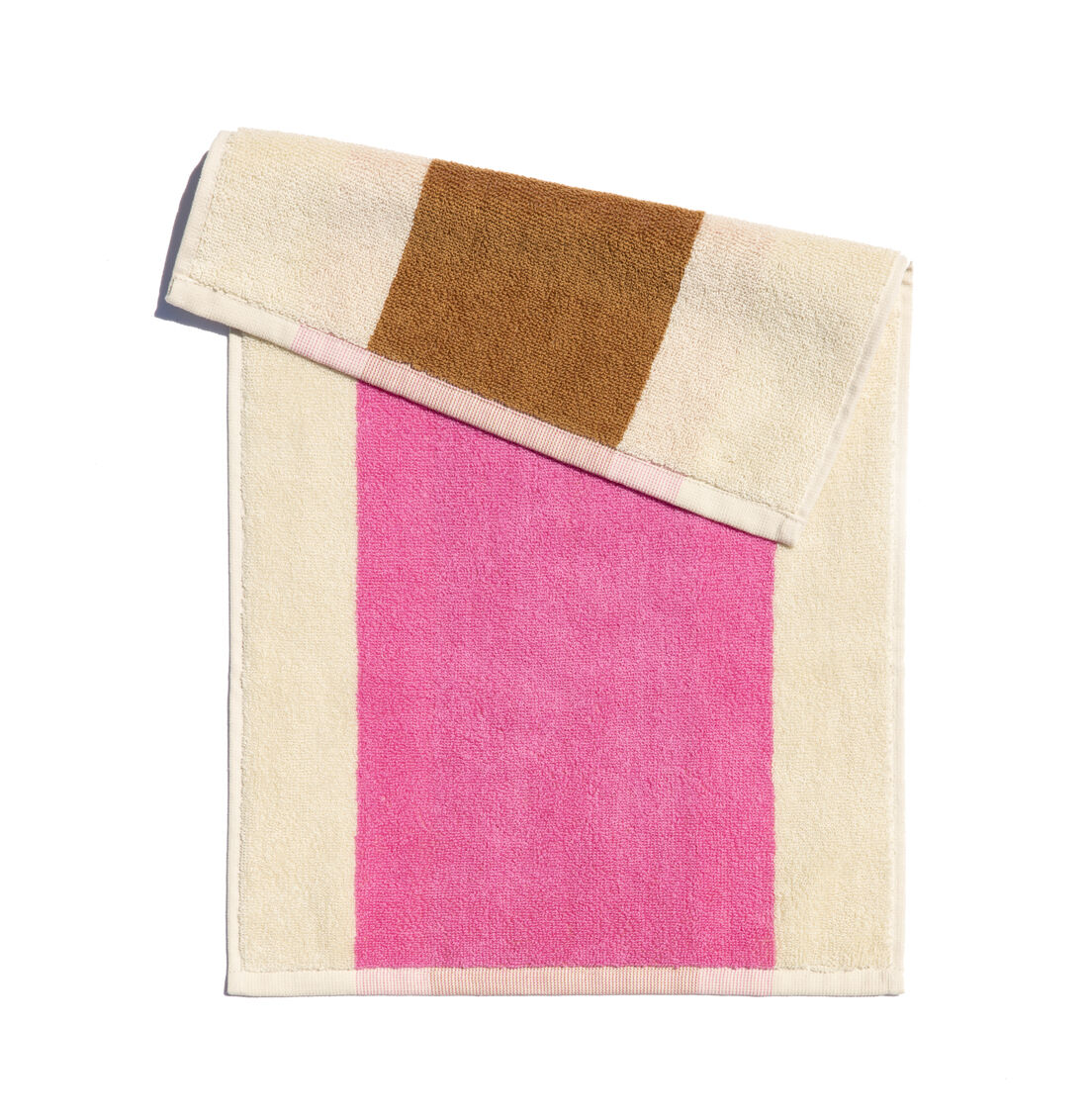 Gästehandtuch Set in verschiedenen Farben, darunter Weiß, Beige, Braun und Pink. Das Set besteht aus einem kleineren Handtuch, das auf einem größeren drapiert ist.