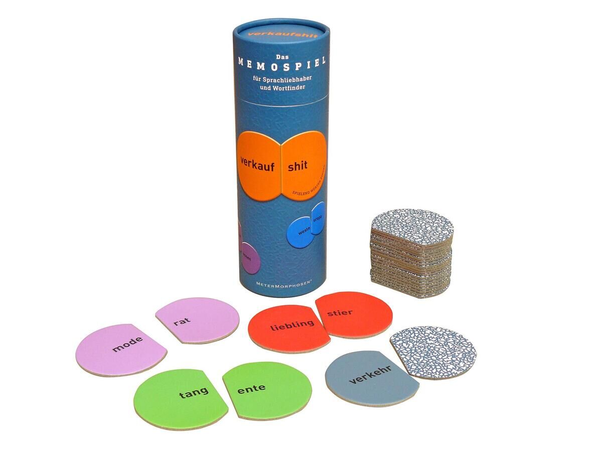 Ein Memo-Spiel bestehend aus runden Karten mit verschiedenen Farben und Wörtern in einem blauen zylindrischen Behälter. Das Spiel heißt 'Verkaufshit'.