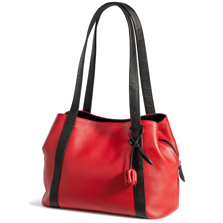 Stilvoller Shopper aus rotem Leder mit schwarzen Henkeln und abnehmbarem, längenverstellbarem Schulterriemen. Die geräumige Tasche besitzt ein dekoratives Tulpen-Accessoire, schwarze Innenausstattung und mehrere Fächer zur übersichtlichen Organisation. Modernes, elegantes Design.