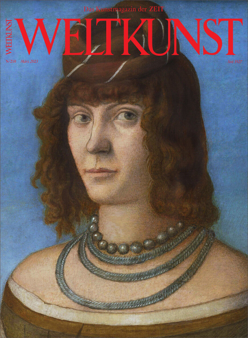 Zeitschriftencover von WELTKUNST mit einem Renaissance-Porträt von Vittore Carpaccio. Der Hintergrund ist überwiegend blau, während der Text in kräftigem Rot gehalten ist. Das Porträt zeigt eine Person mit langen braunen Locken, einem Hut, mehrschichtigen Halsketten und einem ruhigen Gesichtsausdruck.