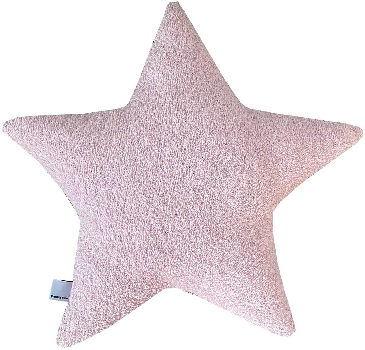 Ein rosa Sternenkissen aus weichem Stoff mit einem weißen Namensschild an der Seite.