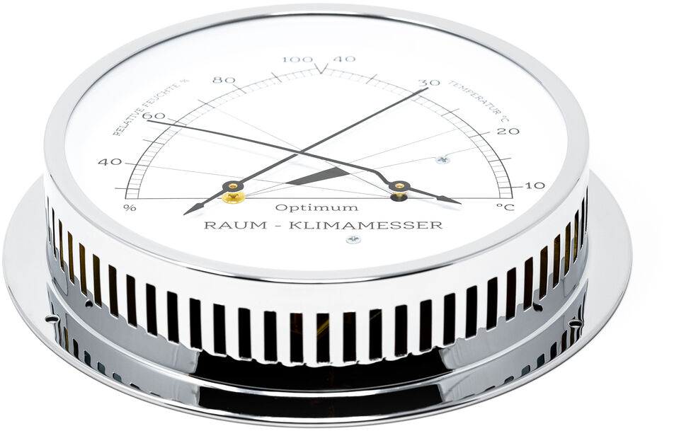Das ZEIT-Sonderedition »Raumklimamesser« zeigt eine analoge Anzeige mit einer silbernen Umrandung und schwarzen Markierungen auf weißem Hintergrund. Es misst Temperatur und Luftfeuchtigkeit und hat ein modernes, minimalistisches Design.