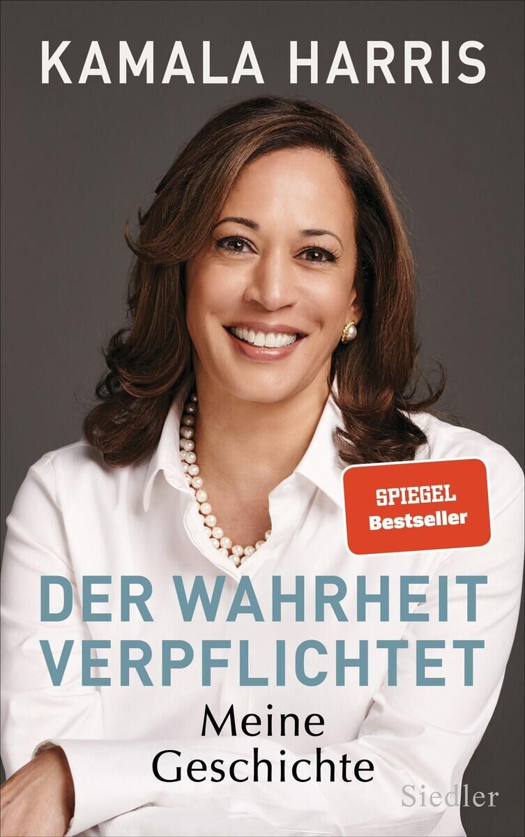 Buchcover 'Der Wahrheit verpflichtet: Meine Geschichte' von Kamala Harris. Das Cover zeigt ein Lächeln einer Frau in einem weißen Hemd auf einem grauen Hintergrund mit blauer und schwarzer Schrift.