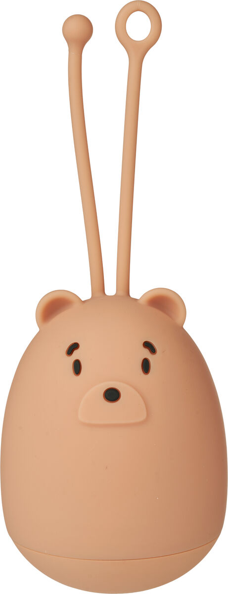 Nachtlicht in Form eines Bären mit dem Namen Watson. Es ist beige mit schwarzen Details für Gesichtszüge und hat zwei lange, biegsame Ohren oben.