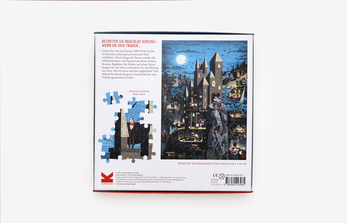 Die Rückseite einer Schachtel mit der Aufschrift 'Die Welt des Grafen Dracula Puzzle' zeigt ein detailliertes Puzzle-Thema mit einem gruseligen Schloss bei Nacht. Verschiedene Vampir-Motive und eine Beschreibung des Puzzles in deutscher Sprache sind ebenfalls auf der Rückseite zu sehen.