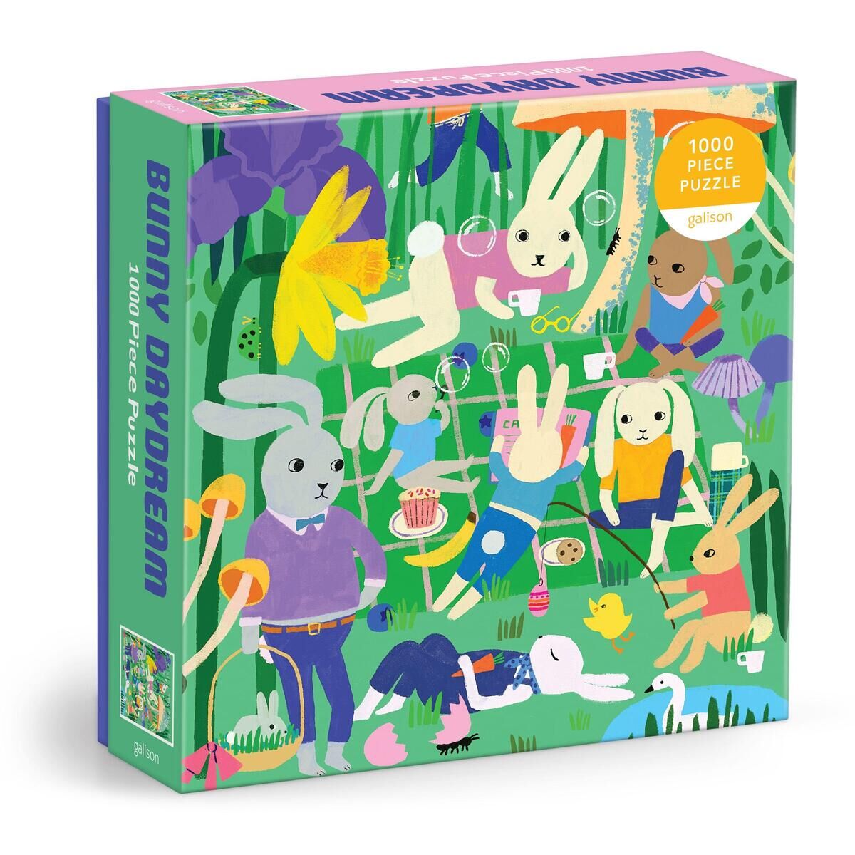 Bunter Puzzle-Karton mit Illustration von anthropomorphen Kaninchen in einem Garten, die verschiedene Aktivitäten ausüben, darunter Stricken und Spielen, mit dem Text 'Bunny Daydream 1000 Piece Puzzle' auf der Vorderseite.