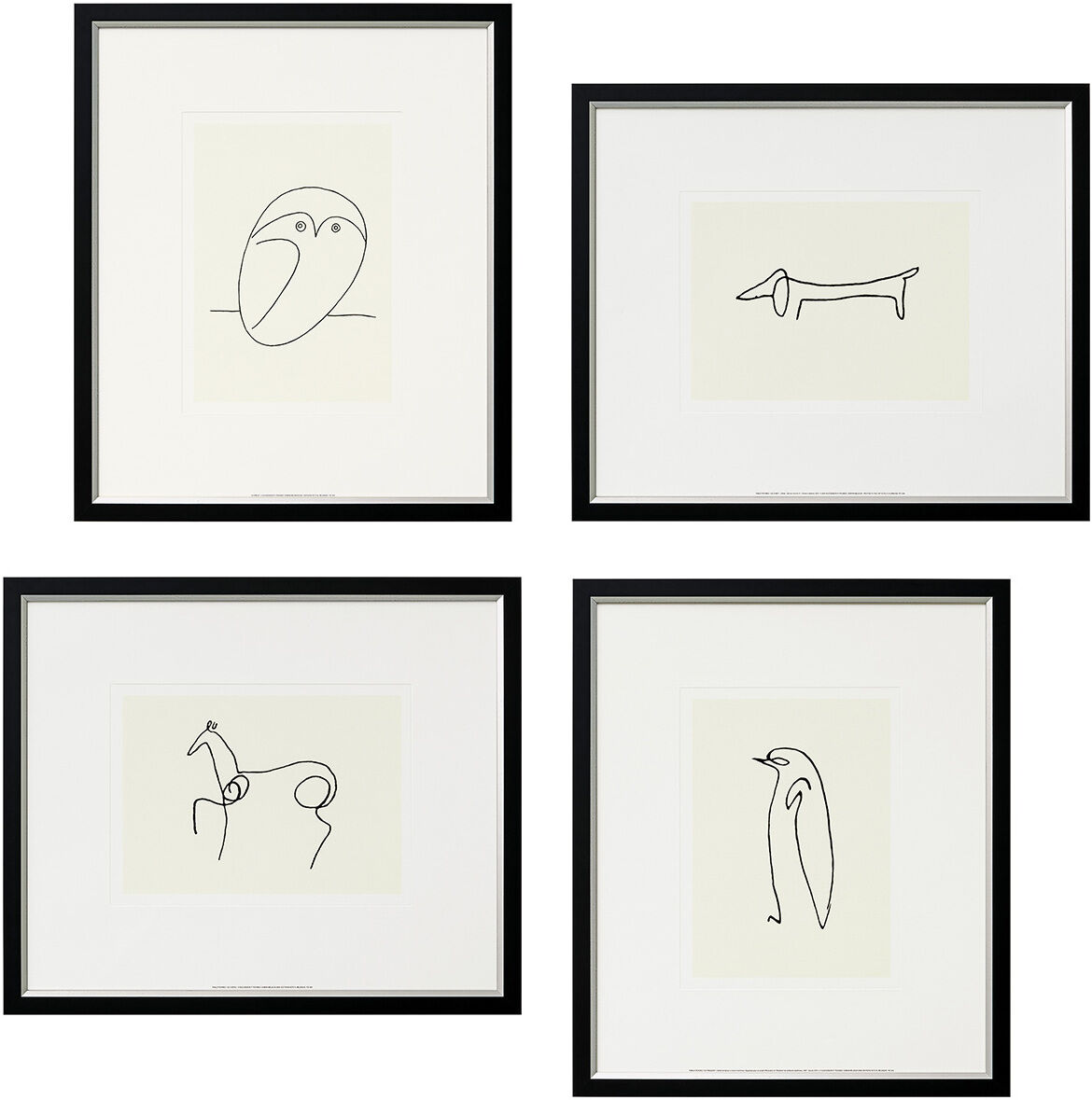 Vier minimalistische Tierzeichnungen im Picasso-Stil, gerahmt in schwarzem Rahmen. Die Kunstwerke sind in Schwarz-Weiß gehalten und zeigen eine Eule, einen Hund, ein Pferd und einen Pinguin.