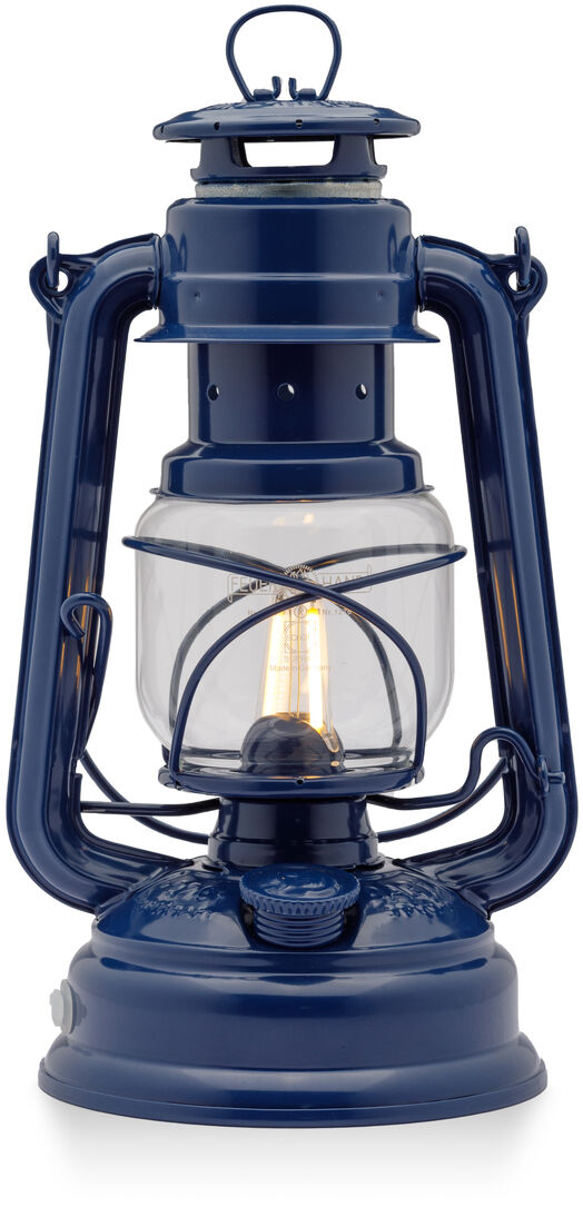 Eine dunkelblaue, vintage-inspirierte LED-Laterne namens 'Baby Special 276' mit klarer Glaskuppel und schwarzem Detaillierungsgrad. Die Laterne hat ein klassisches Design mit einem modernen LED-Licht.