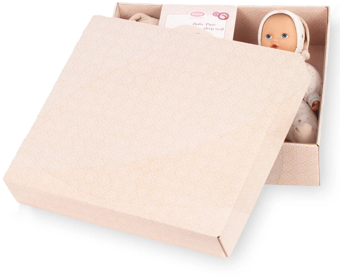 Geschenkbox mit einer Babypuppe im Schlafanzug, Babydecke und Accessoires. Die Box ist offen und zeigt liebevoll arrangierte Babyartikel in sanften Pastellfarben. Ideal als Geschenk zur Geburt oder Taufe.