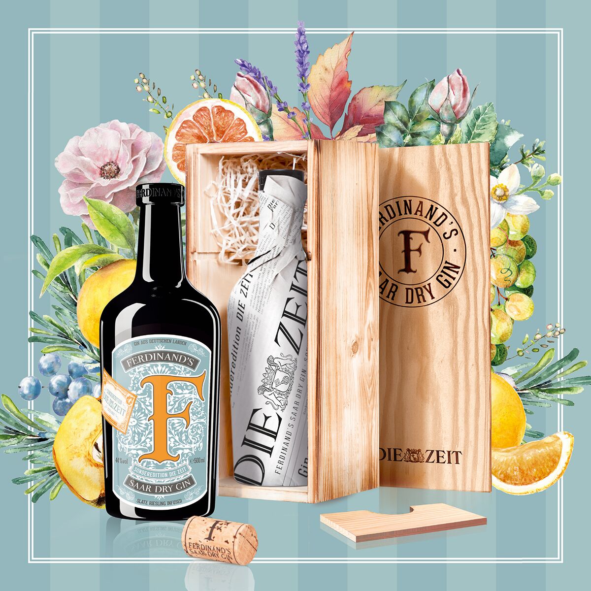 ZEIT-Sonderedition Ferdinand's Saar Dry Gin in einer hölzernen Geschenkverpackung mit floralen und fruchtigen Dekorelementen.