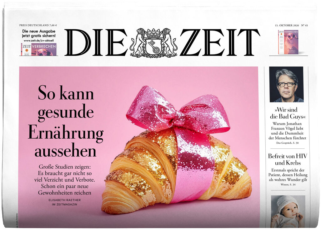 Titelseite der Zeitung DIE ZEIT 45/2026. Im Zentrum ein vergoldetes Croissant mit rosa Glitzer und großer, rosa Geschenk-Schleife vor rosa Hintergrund. Links ein Ernährungsthema, rechts kleine Porträts und Artikelanrisse.